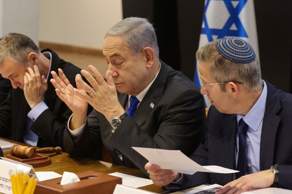 Israeli Prime Minister Benjamin Netanyahu chairs a cabinet meeting at the Kirya, which houses the Israeli Ministry of Defence, in Tel Aviv, Israel on December 17, 2023.