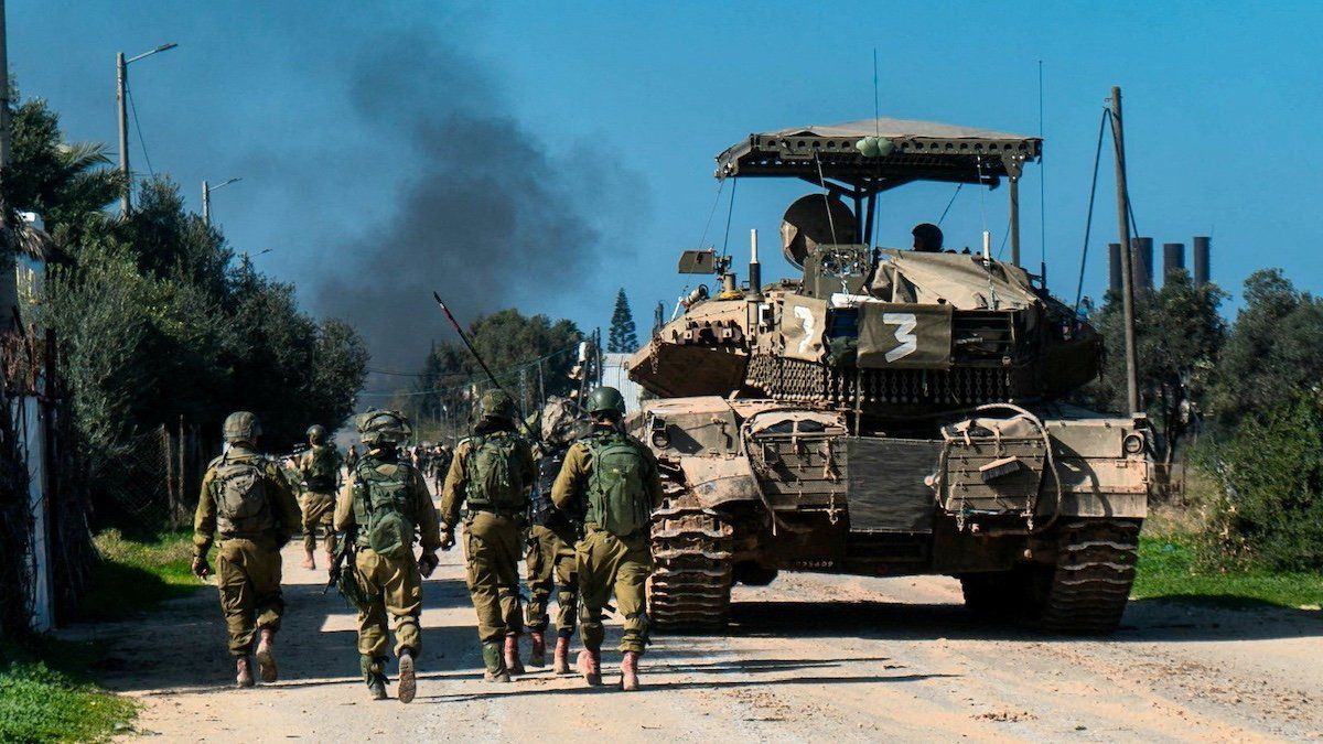 Israeli soldiers operate in the Gaza Strip amid the ongoing conflict between Israel and the Palestinian Islamist group Hamas, in this handout picture released on January 28, 2024.