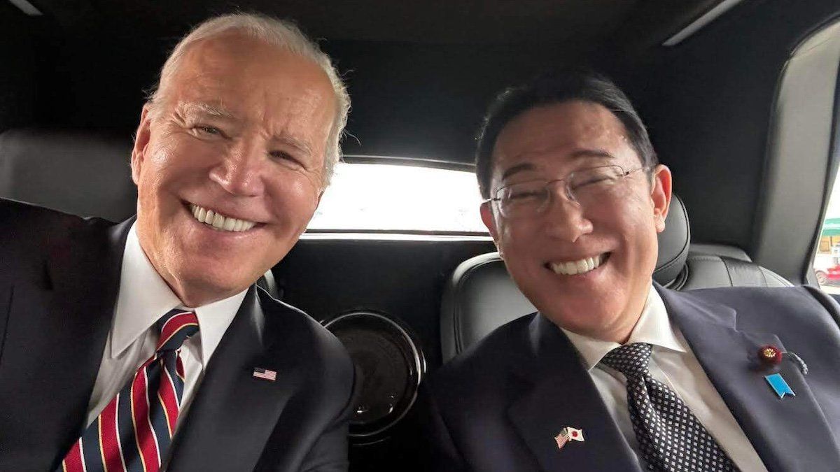 Japan Prime Minister Fumio Kishida poses with U.S President Joe Biden as they are on the way to state dinner in Washington DC, U.S, on April 10, 2024.