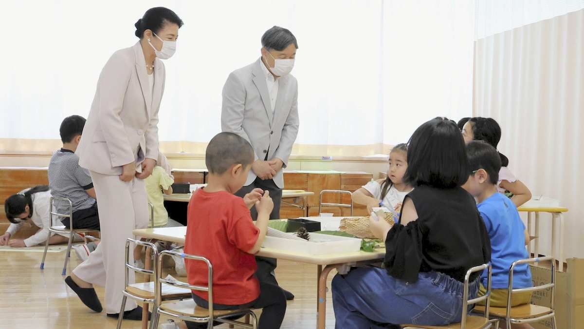 ​Japanese Emperor Naruhito and Empress Masako visit a kindergarten in Tokyo on May 21, 2024.