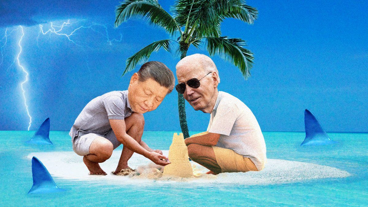 Joe Biden and Xi Jingping build a sandcastle surrounded by sharks