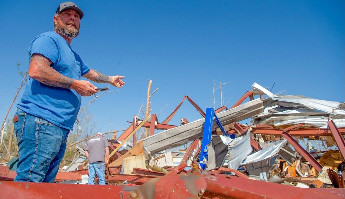 John Green pulled a friend's body from a building in Plantersville, Ala., on Sunday, March 16, 2025, after a a deadly overnight tornado hit the area.​