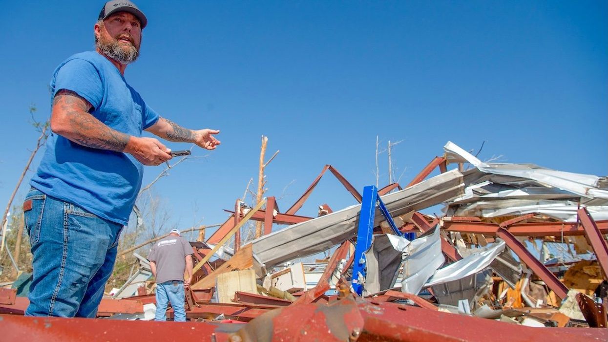 John Green pulled a friend's body from a building in Plantersville, Ala., on Sunday, March 16, 2025, after a a deadly overnight tornado hit the area.