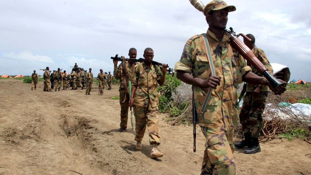 Jubbaland forces carry their ammunitions during a security patrol against Islamist al Shabaab militants in Bulagaduud town, north of Kismayu, Somalia.