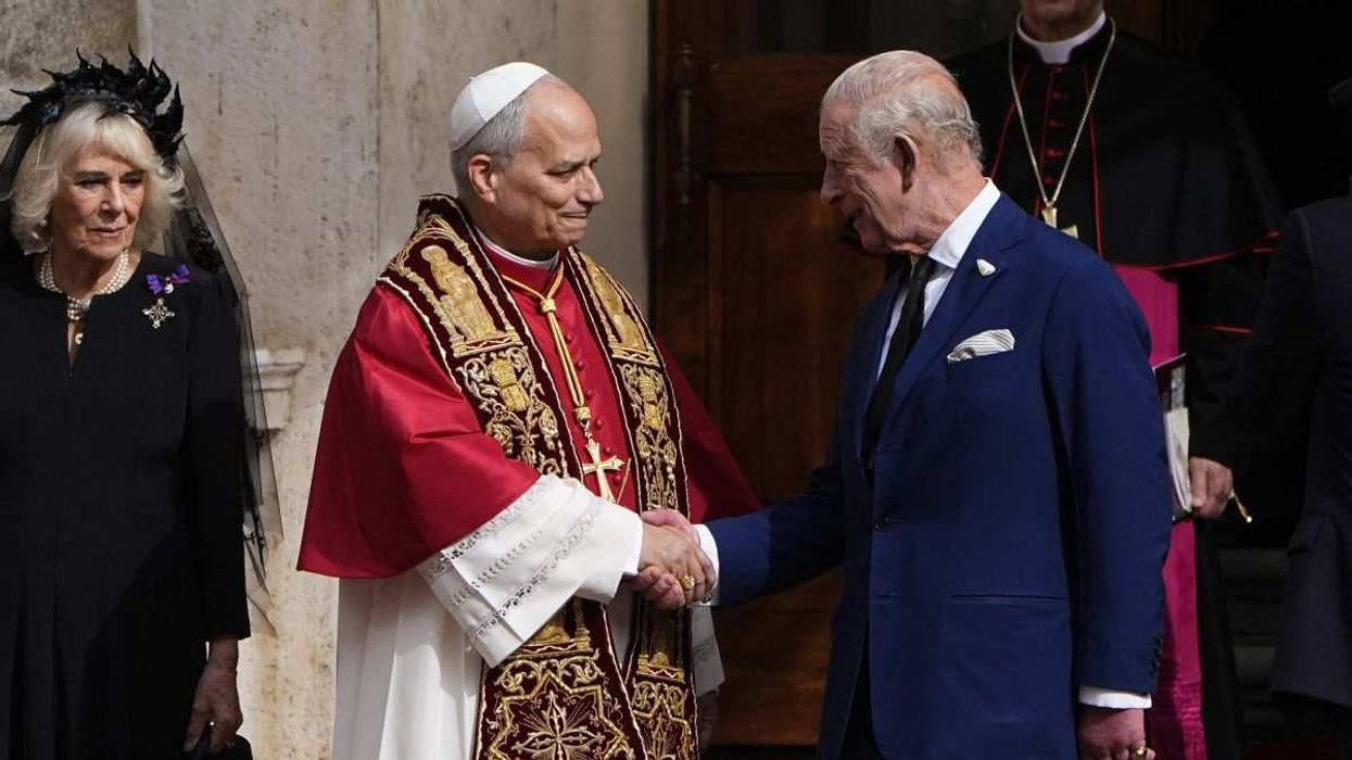 King Charles III says goodbye to Pope Leo XIV in the San Damaso Courtyard, in St Peter's Square, on October 23, 2025.