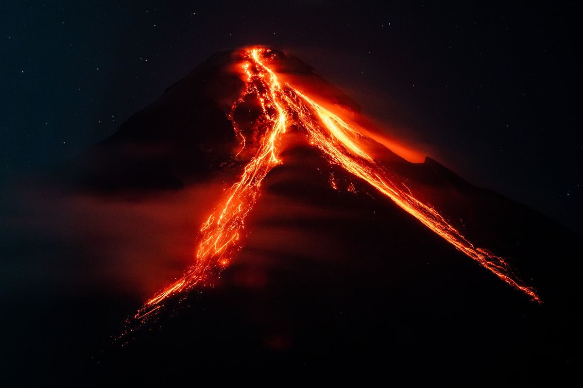Lava and ashes flow from the Mayon volcano in Albay province, Philippines.