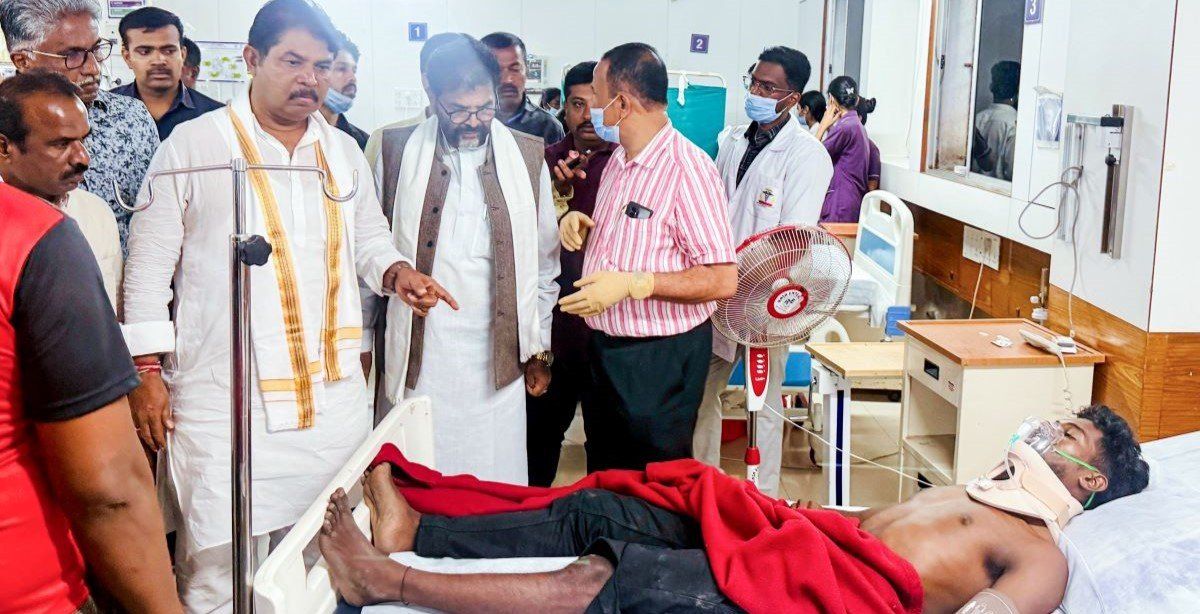 Leader of the Opposition of the Karnataka Assembly, R Ashok, with Bharatiya Janata Party (BJP) State President BY Vijayendra, meets the injured in the stampede at M Chinnaswamy Stadium, at a Hospital in Bengaluru on Wednesday.