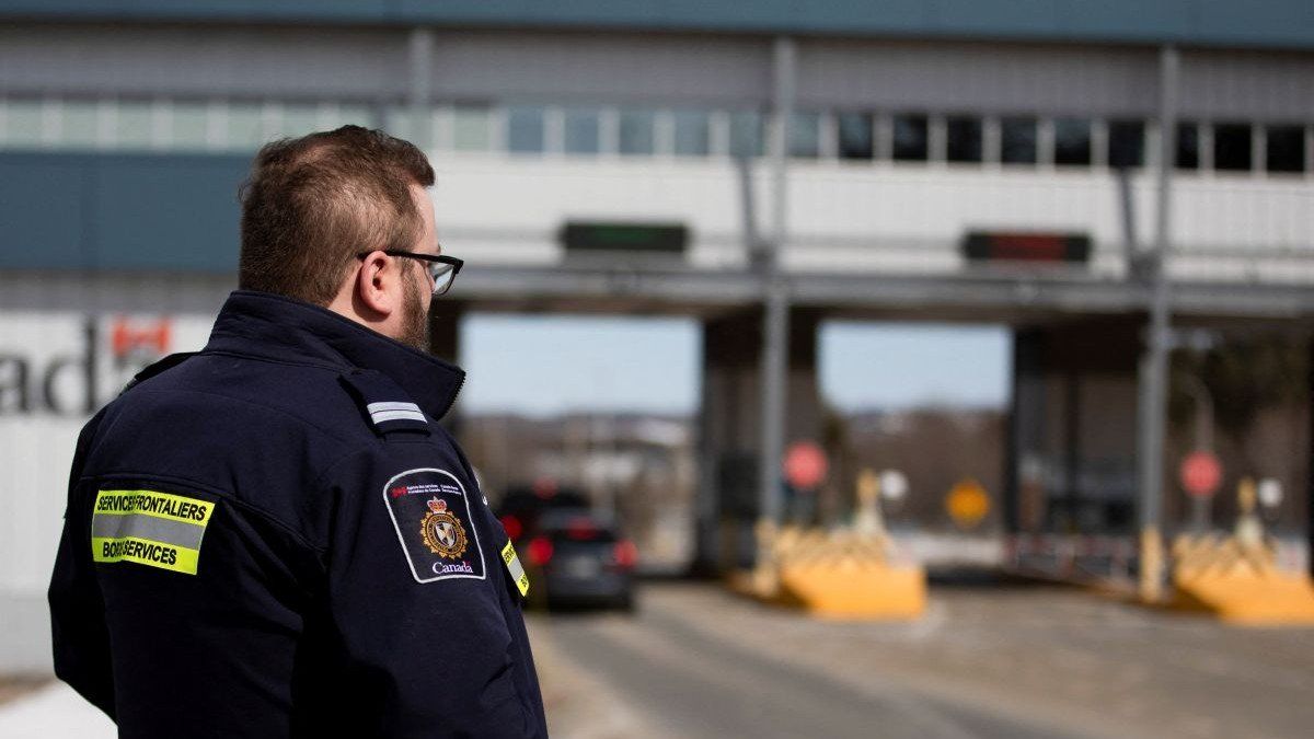 A Canadian border services superintendent, stands at the Canada Border Service Agency (CBSA) border crossing with the United States in Stanstead, Quebec, Canada 