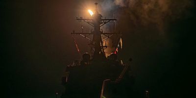 ​A missile is launched from a warship during the US-led coalition operation against military targets in Yemen on Jan. 12, 2024. 