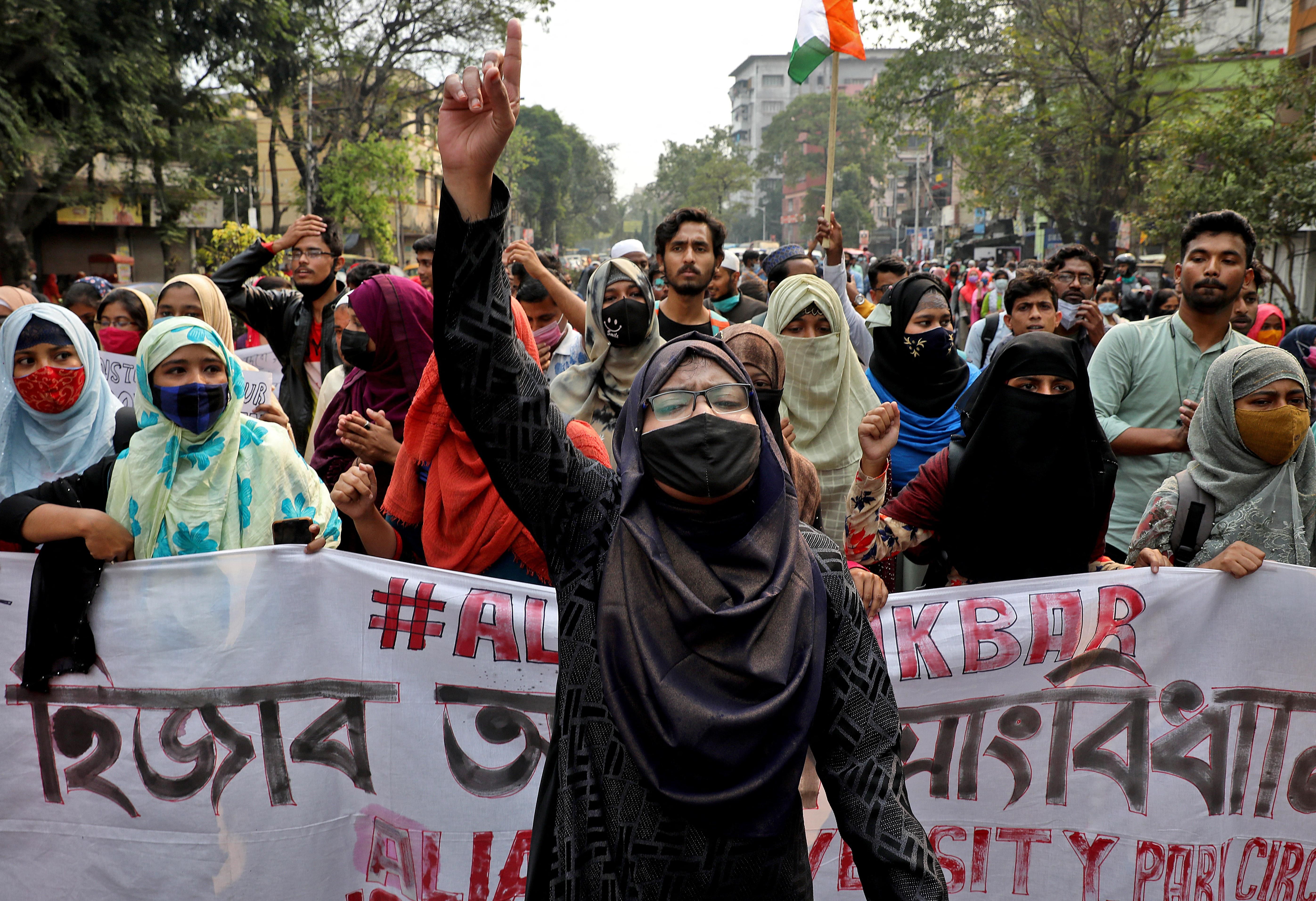 Hard Numbers: Indian hijab protests, Chinese windfall for sub-Saharan Africa, Germany running low on gas, Russian political zoo