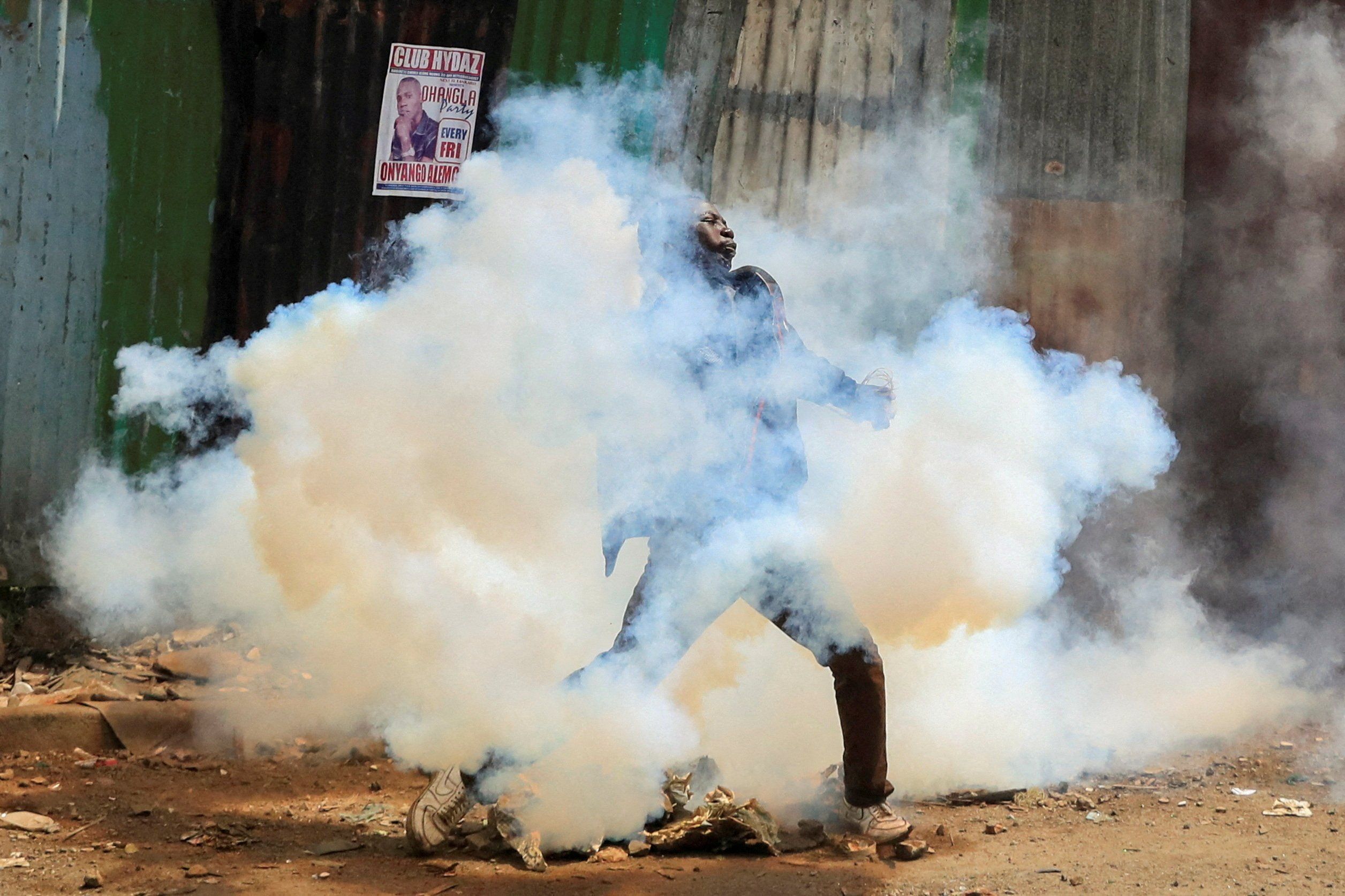 A supporter of Kenya's opposition leader Raila Odinga during an anti-government protest over new tax hikes.