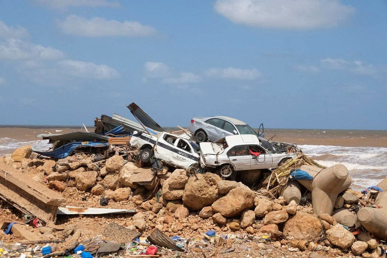 A view shows the damaged cars, after a powerful storm and heavy rainfall hit Libya.
