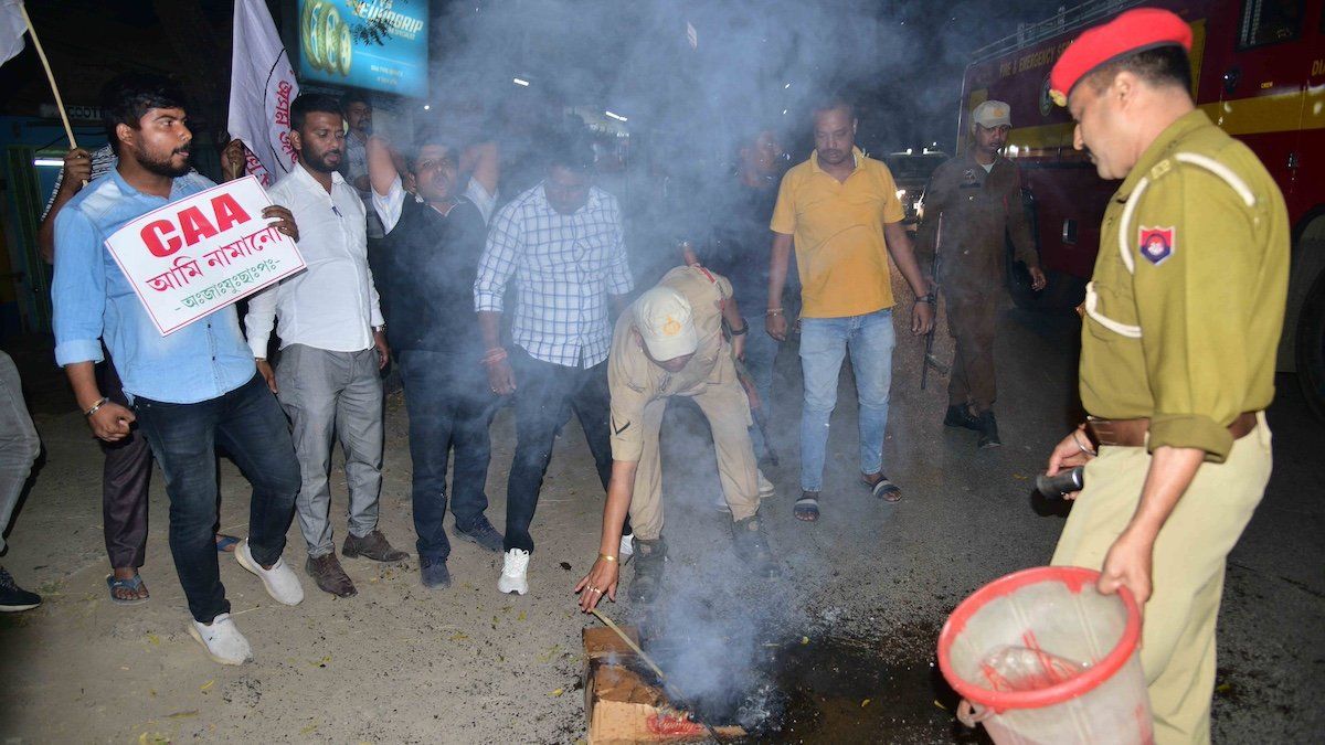 ​Activists from the Asom Jatiyatabadi Yuba Chatra Parishad (AJYCP) are staging a protest after the central government notified the rules for the implementation of the Citizenship (Amendment) Act, 2019, in Nagaon District, Assam, India, on March 11, 2024. 