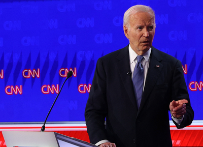 Democrat candidate, U.S. President Joe Biden, points during a presidential debate with Republican candidate, former U.S. President Donald Trump, in Atlanta, Georgia, U.S., June 27, 2024.