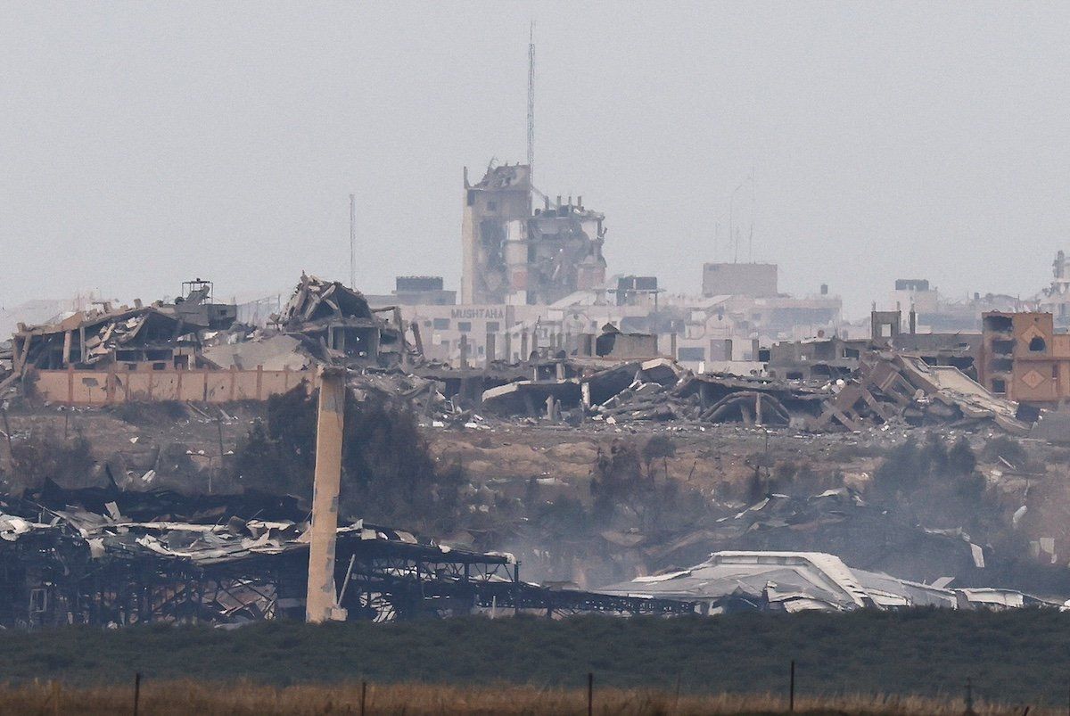 Destroyed buildings lie in ruin in the Gaza Strip, amid the ongoing conflict between Israel and the Palestinian Islamist group Hamas, as seen from southern Israel, December 21, 2023.