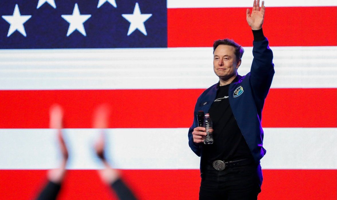 Elon Musk waves to the crowd as he exits the stage during a town hall on Sunday, March 30, 2025, at the KI Convention Center in Green Bay, Wis.  