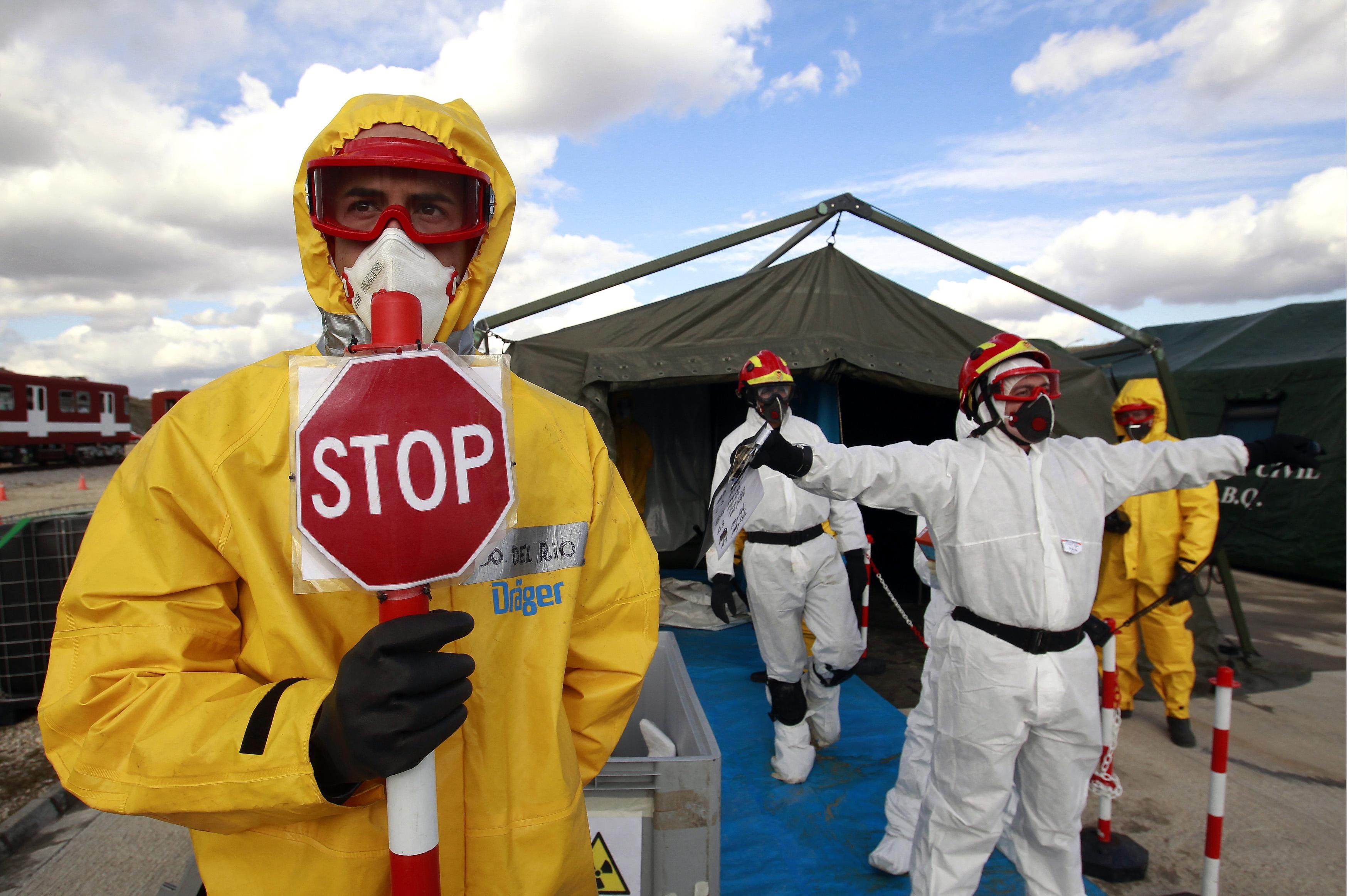 Emergency workers during an emergency response drill to simulate the aftermath of a dirty bomb explosion outside Madrid.