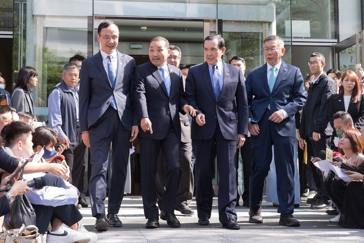Eric Chu, Taiwan’s main opposition Kuomintang (KMT) chairman, Hou Yu-ih, KMT presidential candidate, Ma Ying-jeou, former Taiwan president and Ke Wen-je, presidential candidate from the Taiwan People’s Party (TPP) pose after thier meeting on November 15, 2023.