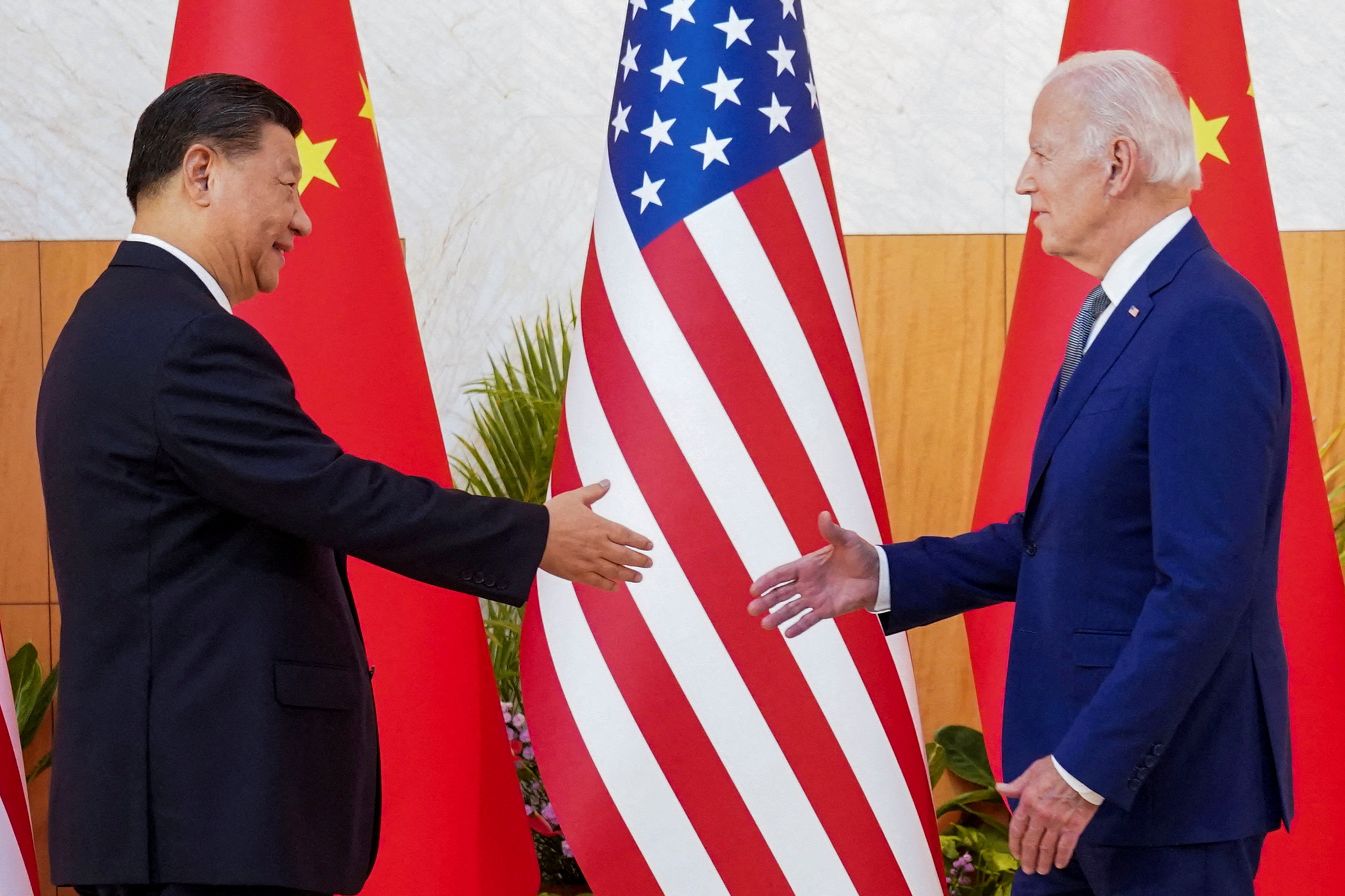 FILE PHOTO: U.S. President Joe Biden meets with Chinese President Xi Jinping on the sidelines of the G20 leaders' summit in Bali, Indonesia, November 14, 2022.