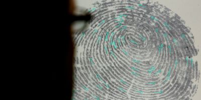 Fingerprint and loupe.