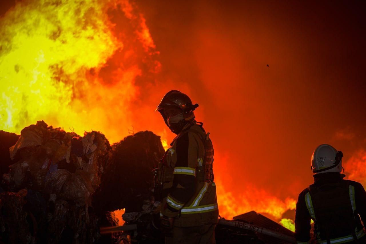 Firefighters at the site of a Russian missile attack in Zaporizhzhia, Ukraine.