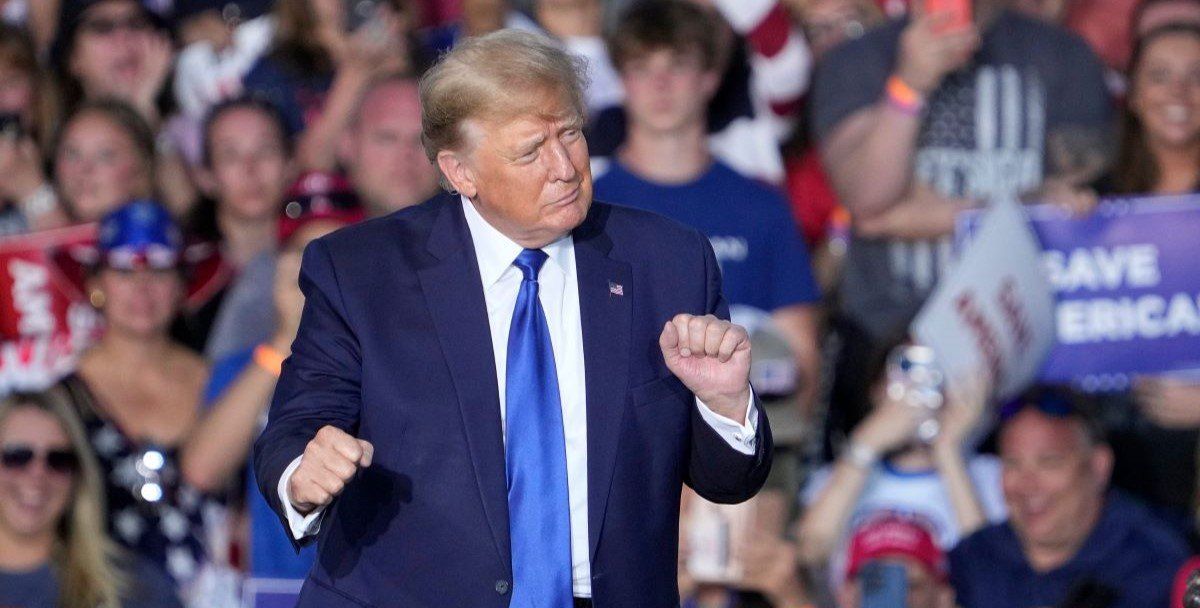 ​Former President Donald Trump dances as he leaves the stage during a rally at the Delaware County Fairgrounds. 
