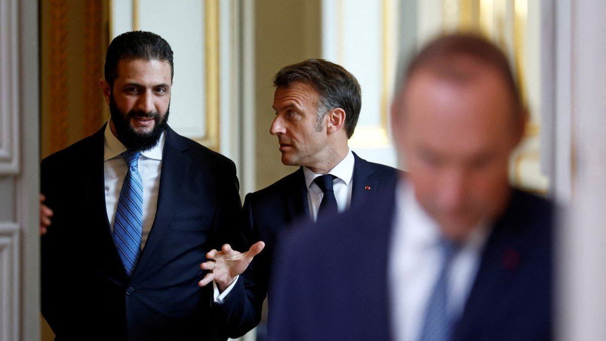 ​French President Emmanuel Macron talks with Syrian President Ahmed al-Sharaa at the Elysee Palace in Paris, France, on May 7, 2025.