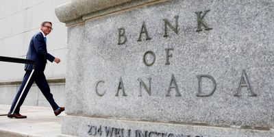 Governor of the Bank of Canada Tiff Macklem walks outside the Bank of Canada building in Ottawa, Ontario.