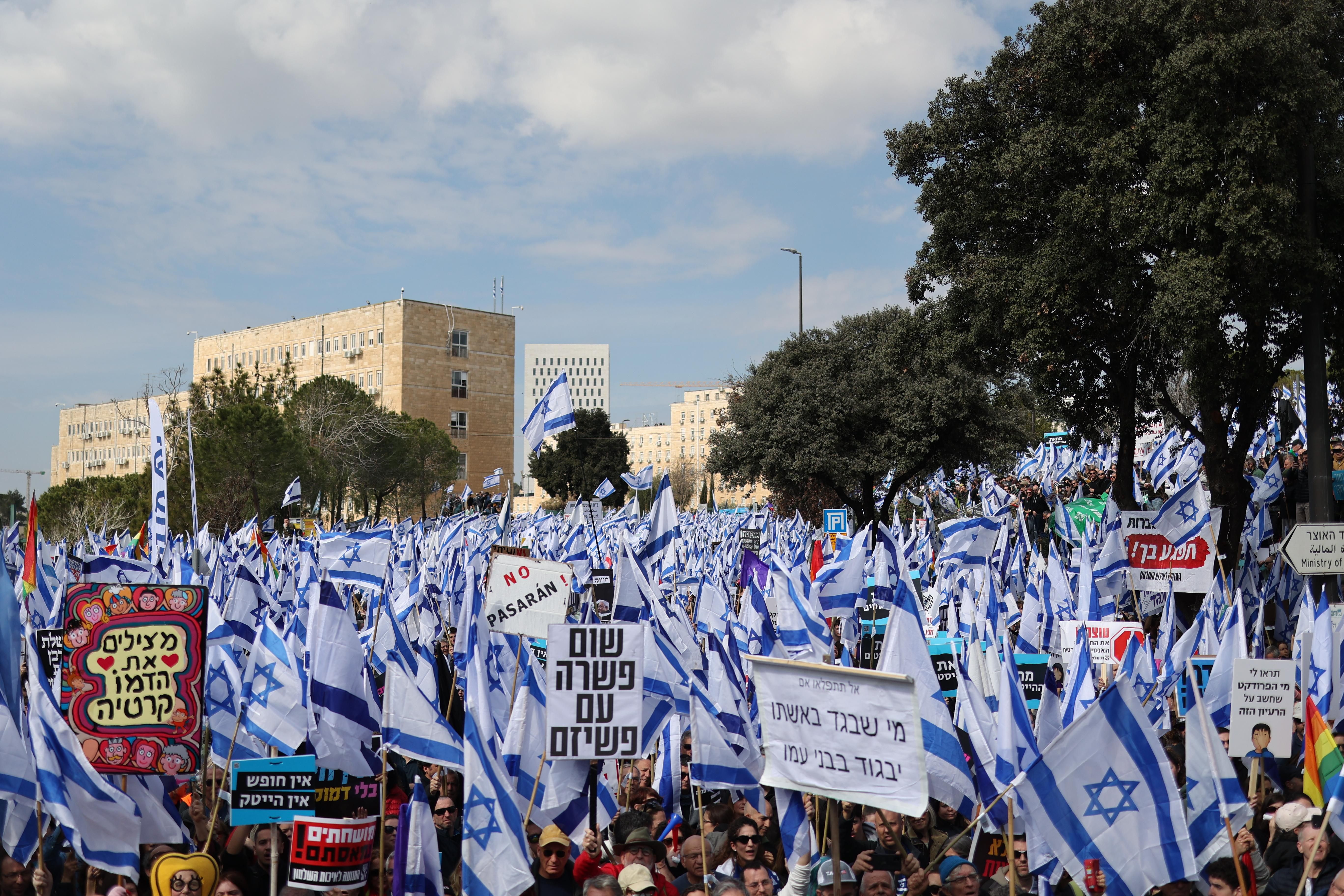 Israeli protesters demonstrate against the right-wing government outside the Knesset in Jerusalem.