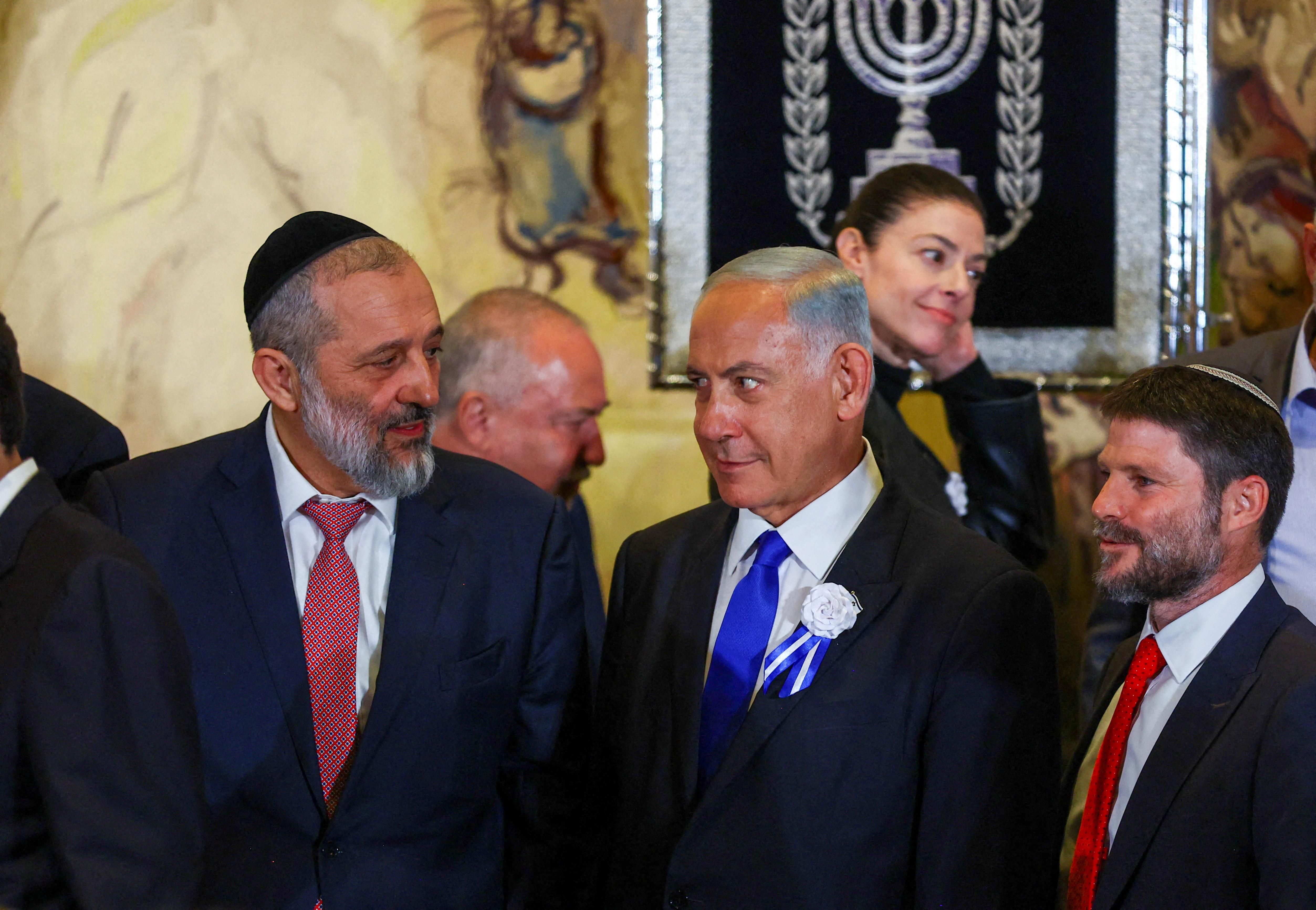 Israel's PM Benjamin Netanyahu with other members of the new Israeli parliament after their swearing-in ceremony in Jerusalem.