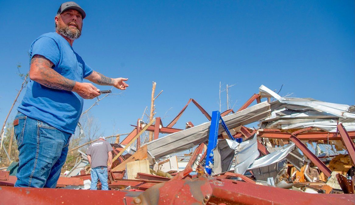 John Green pulled a friend's body from a building in Plantersville, Ala., on Sunday, March 16, 2025, after a a deadly overnight tornado hit the area.​