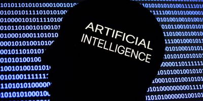 An artificial intelligence sign is displayed on a phone screen, with the shape of a human face and binary code in an illustration. 