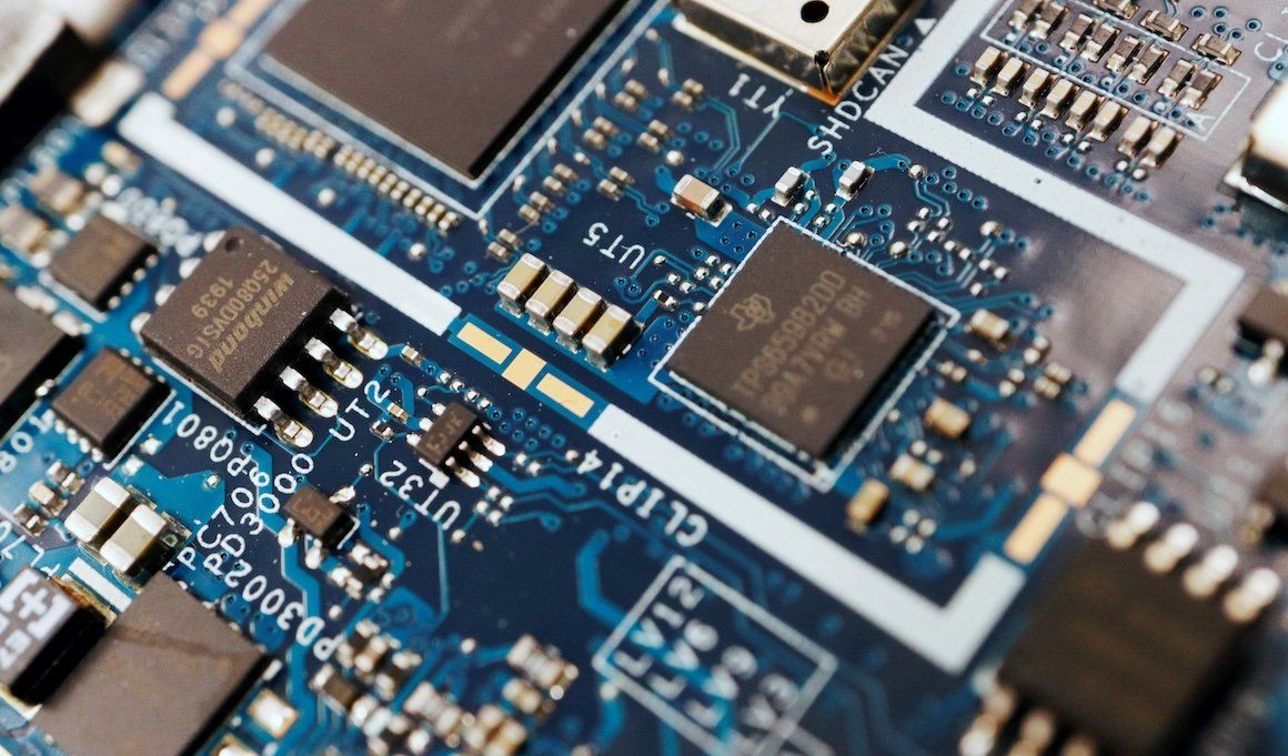 ​Semiconductor chips are seen on a circuit board of a computer in this illustration.