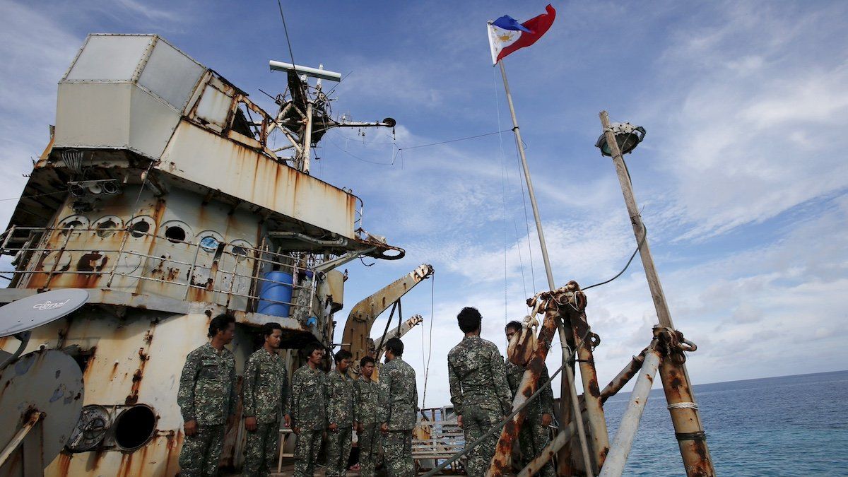 ​Members of Philippine Marines is pictured at BRP Sierra Madre, a dilapidated Philippine Navy ship that has been aground since 1999 and became a Philippine military detachment on the disputed Second Thomas Shoal, part of the Spratly Islands, in the South China Sea March 29, 2014. Picture taken March 29, 2014. 
