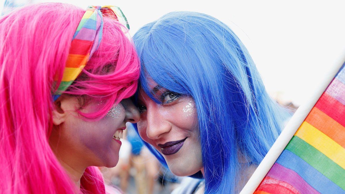 ​People take part in the annual Gay Pride parade in support of LGBT community, in Santiago, Chile, June 22, 2019. 