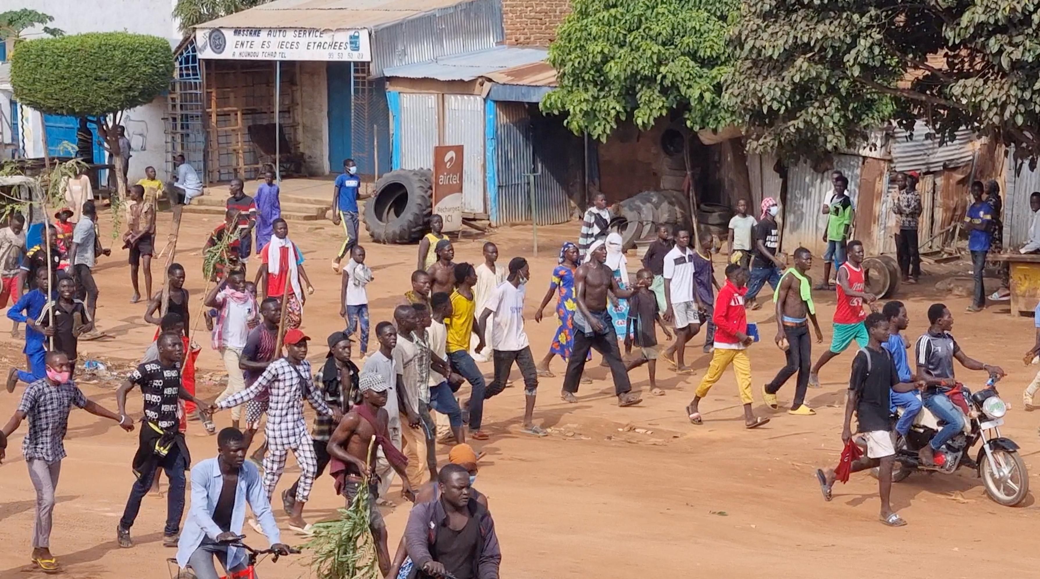 People walk as they protest in Moundou, Chad. 