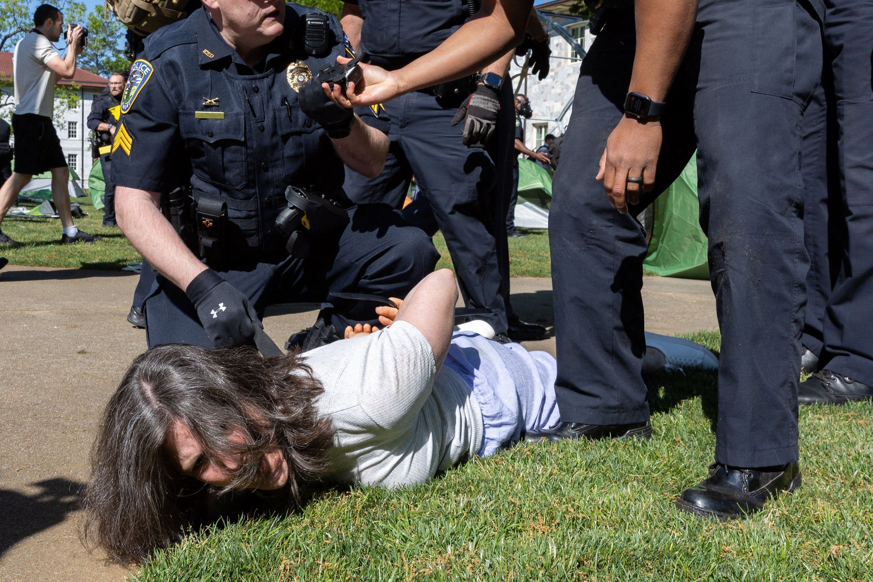 Police arrest Emory economics professor Caroline Fohlin during a rally in which Pro-Palestinian protestors set up an encampment at the Emory Campus in Atlanta, on Thursday, April 25, 2024. 