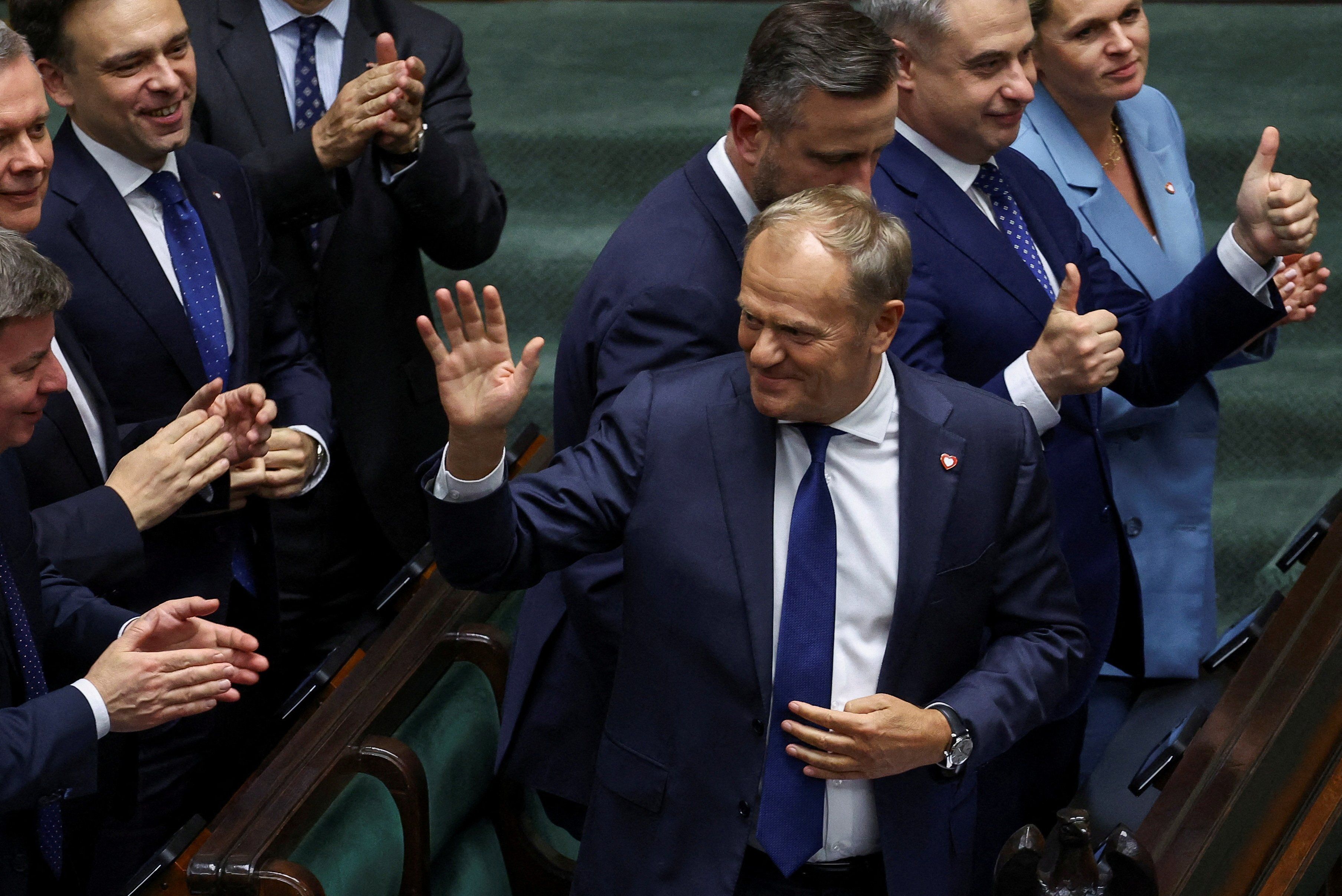 Polish Prime Minister Donald Tusk reacts after a vote of confidence for his center-left coalition government.