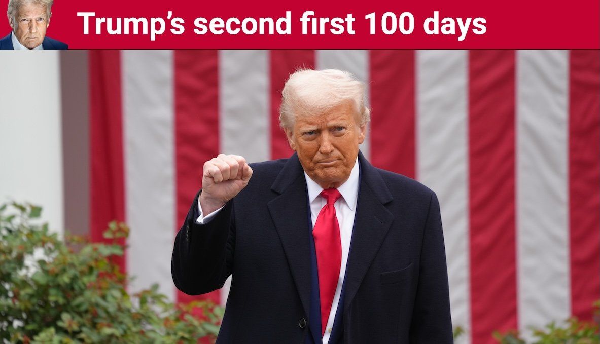 President Donald Trump raises a fist during a ceremony where he signs two executive orders that will lead to reciprocal tariffs against other countries that charge tariffs on US goods.