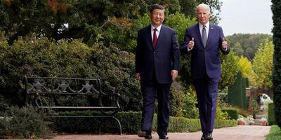President Joe Biden gives thumbs-up as he walks with Chinese President Xi Jinping on the sidelines of the Asia-Pacific Economic Cooperation in California on Nov. 15, 2023. 
