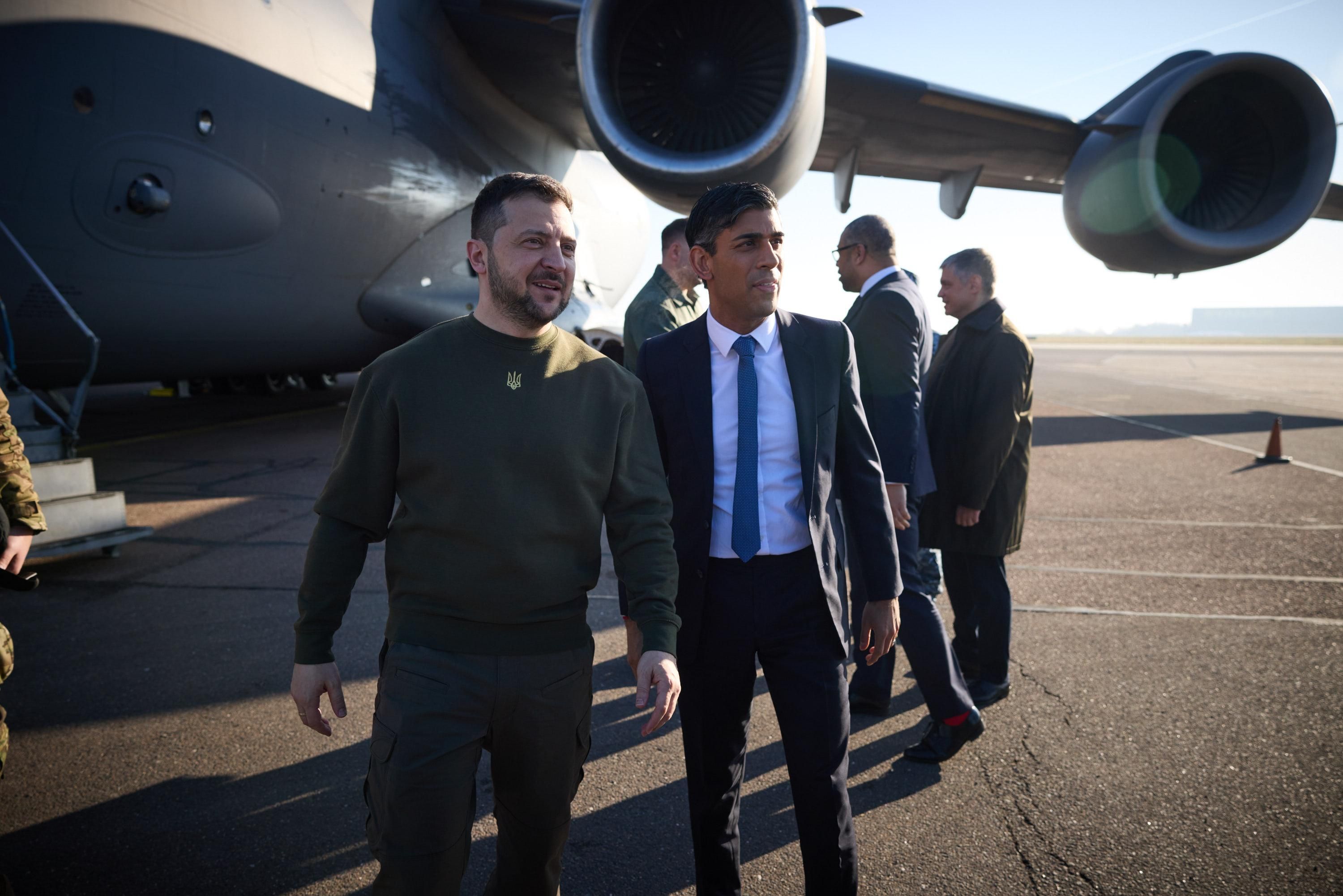President Volodymyr Zelensky is greeted by British Prime Minister Rishi Sunak as he arrives Britain.
