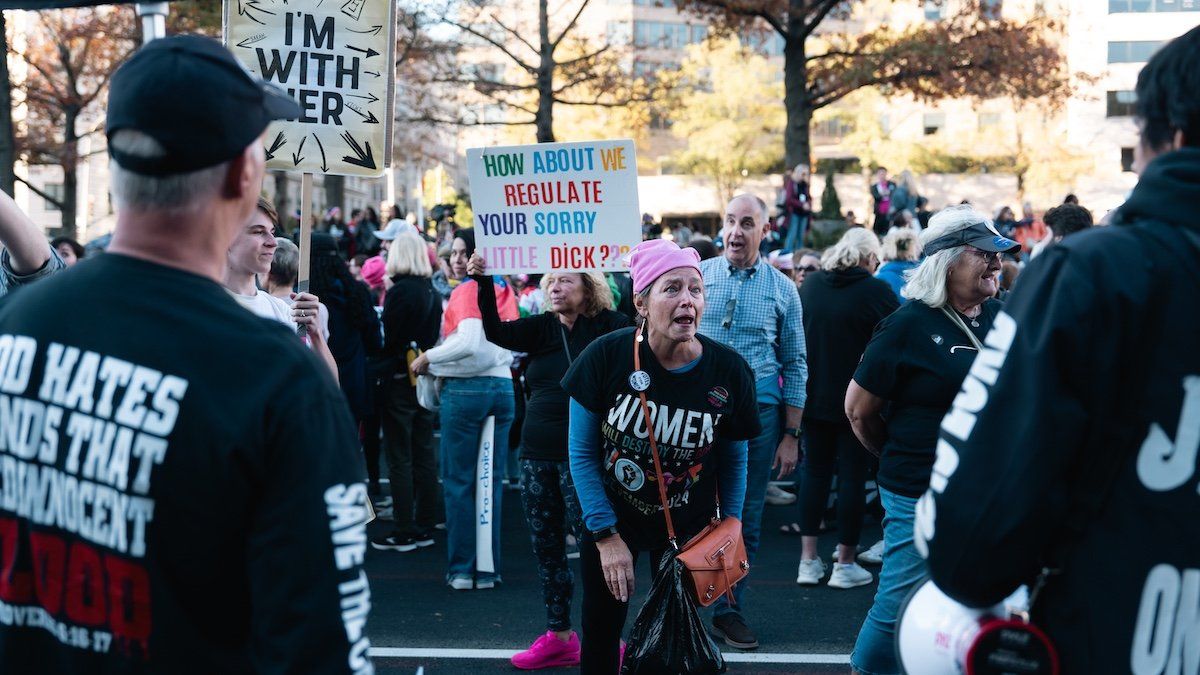 ​Protestors shout at counterprotesters at the Women’s March at Freedom Plaza in Washington, D.C., USA, on November 2, 2024.