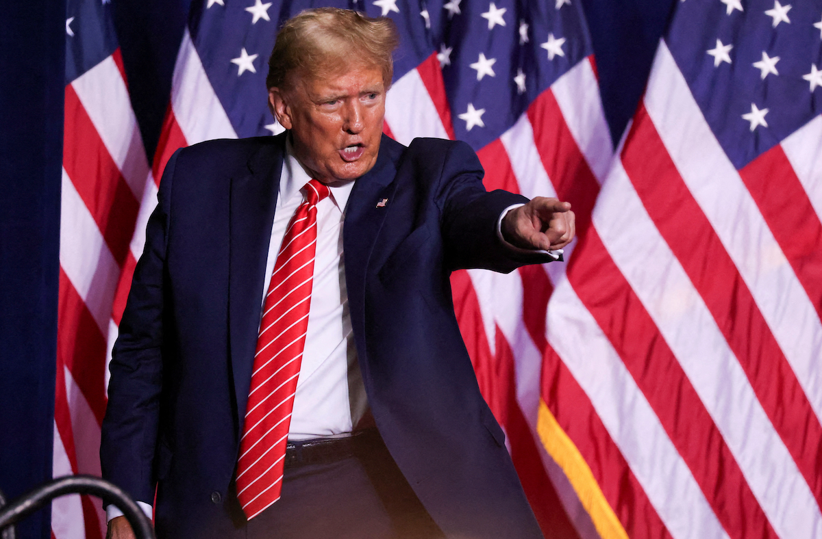 Republican presidential candidate and former President Donald Trump reacts during a campaign rally in Rome, Georgia, on March 9, 2024. 