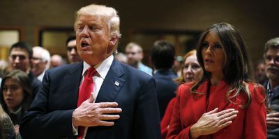 Republican Presidential Candidate Donald Trump recites the pledge of allegiance with his wife Melania, back in 2016.