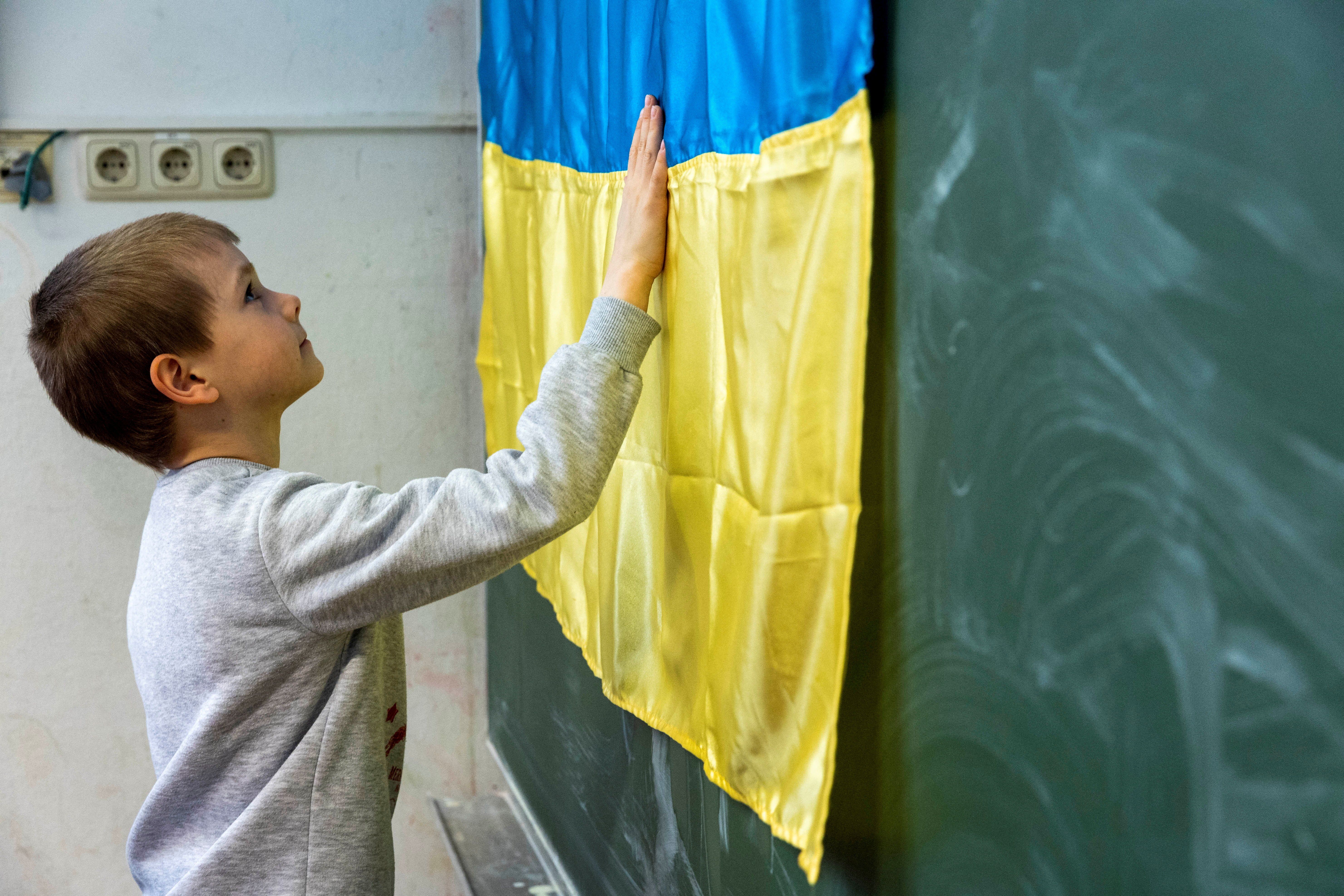 Schoolchildren who fled Ukraine attend a mixed class with other Ukrainian children living in Vienna, Austria.
