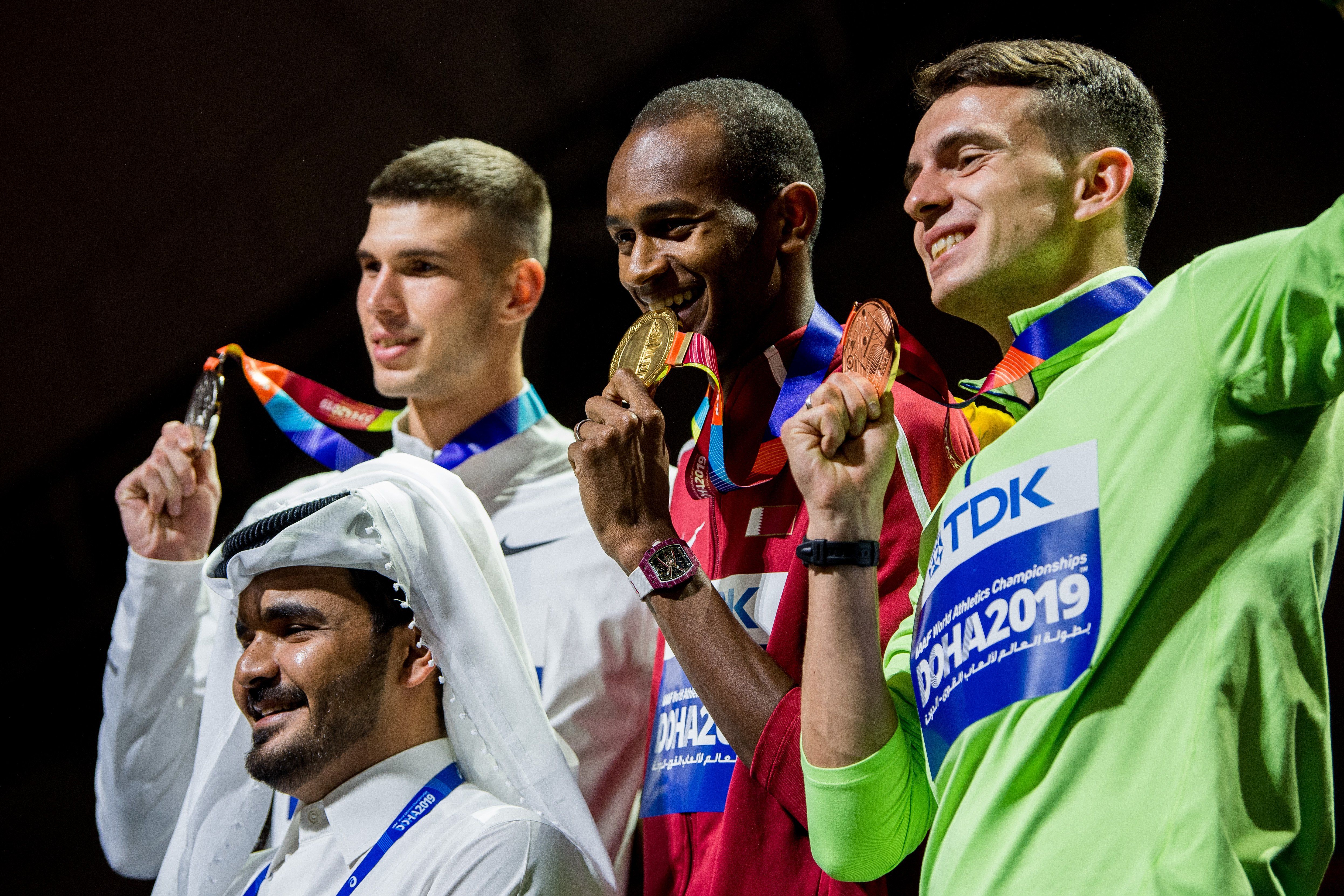 Sheikh Joaan bin Hamad Al Thani, President of the Qatar Olympic Committee, Mikhail Akimenko of Authorised Neutral Athlete (ANA), Mutaz Essa Barshim of Qatar and Ilya Ivanyuk of ANA at the medal ceremony.