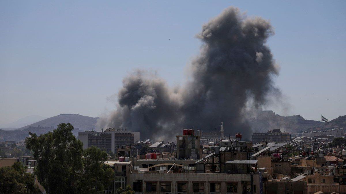 ​Smoke rises from Syria’s defense ministry in Damascus, Syria, on July 16, 2025.
