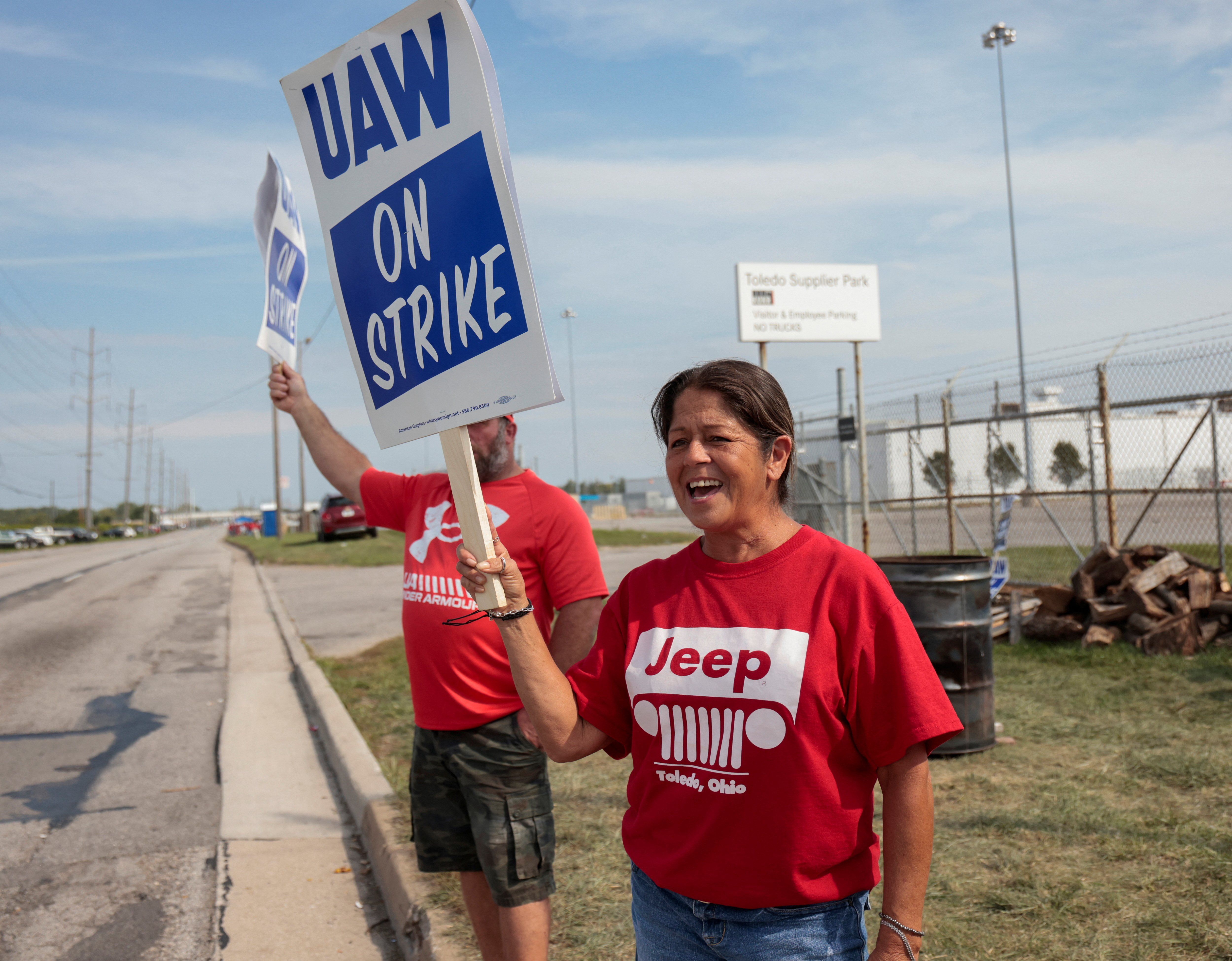 Striking United Auto Workers members picket outside the Stellantis Jeep Plant in Toledo, Ohio. 