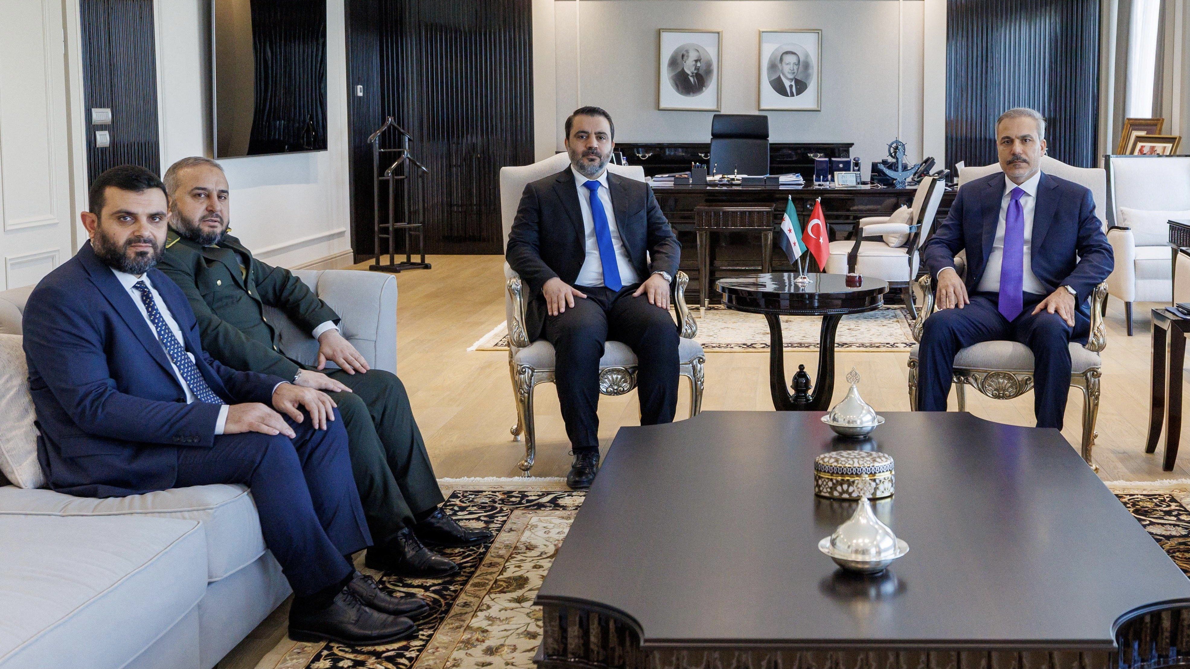 Syrian Foreign Minister Asaad Hassan al-Shibani, accompanied by General Intelligence Service Director Hussein Al-Salama and Defence Minister Murhaf Abu Qasra, meets with his Turkish counterpart Hakan Fidan in Ankara, Turkey, August 13, 2025. 