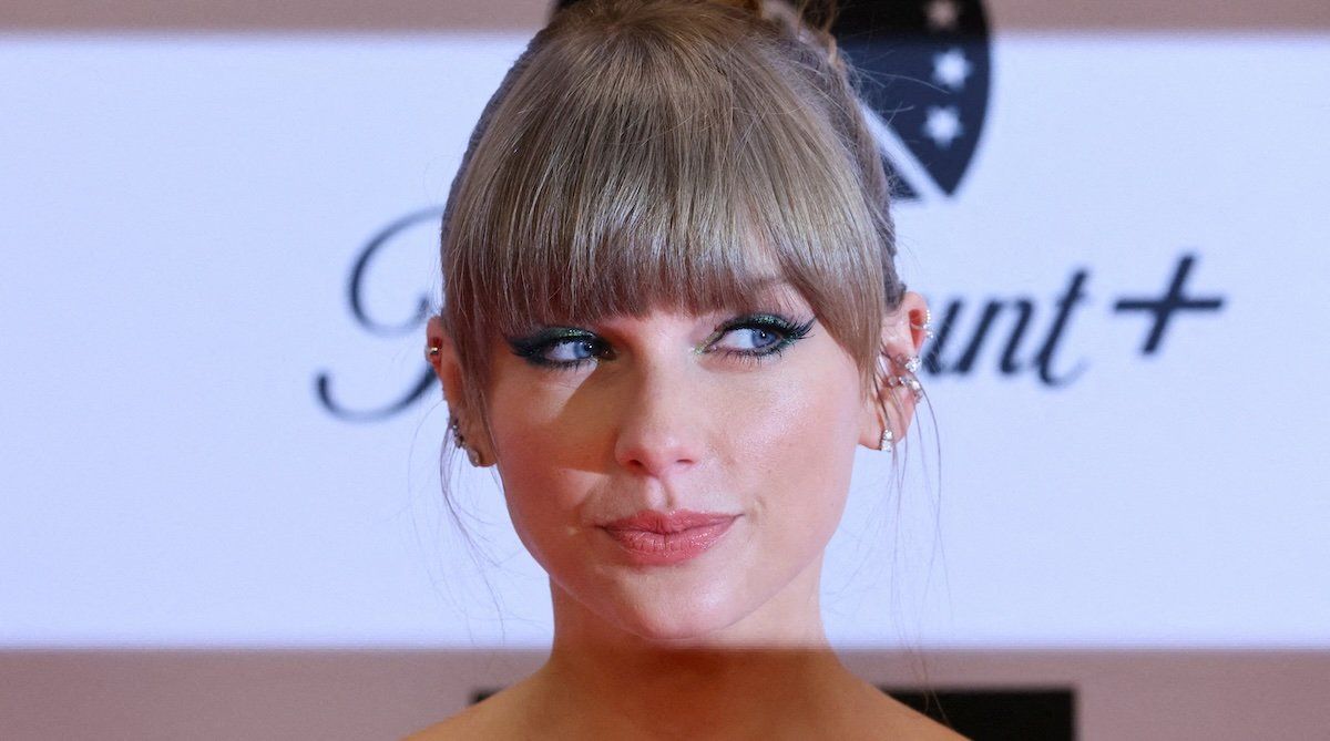 Taylor Swift poses on the red carpet for the 2022 MTV Europe Music Awards (EMAs) at the PSD Bank Dome in Duesseldorf, Germany, November 13, 2022.